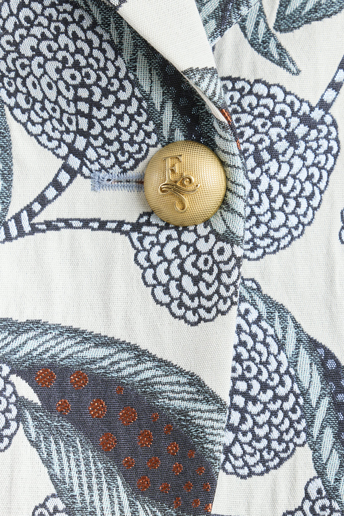 Blazer estampado azul modelo Gilberta con diseño floral de The Extreme Collection.